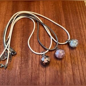 Hand filled glass globe pendants with assorted crystal chips. Set of 3.